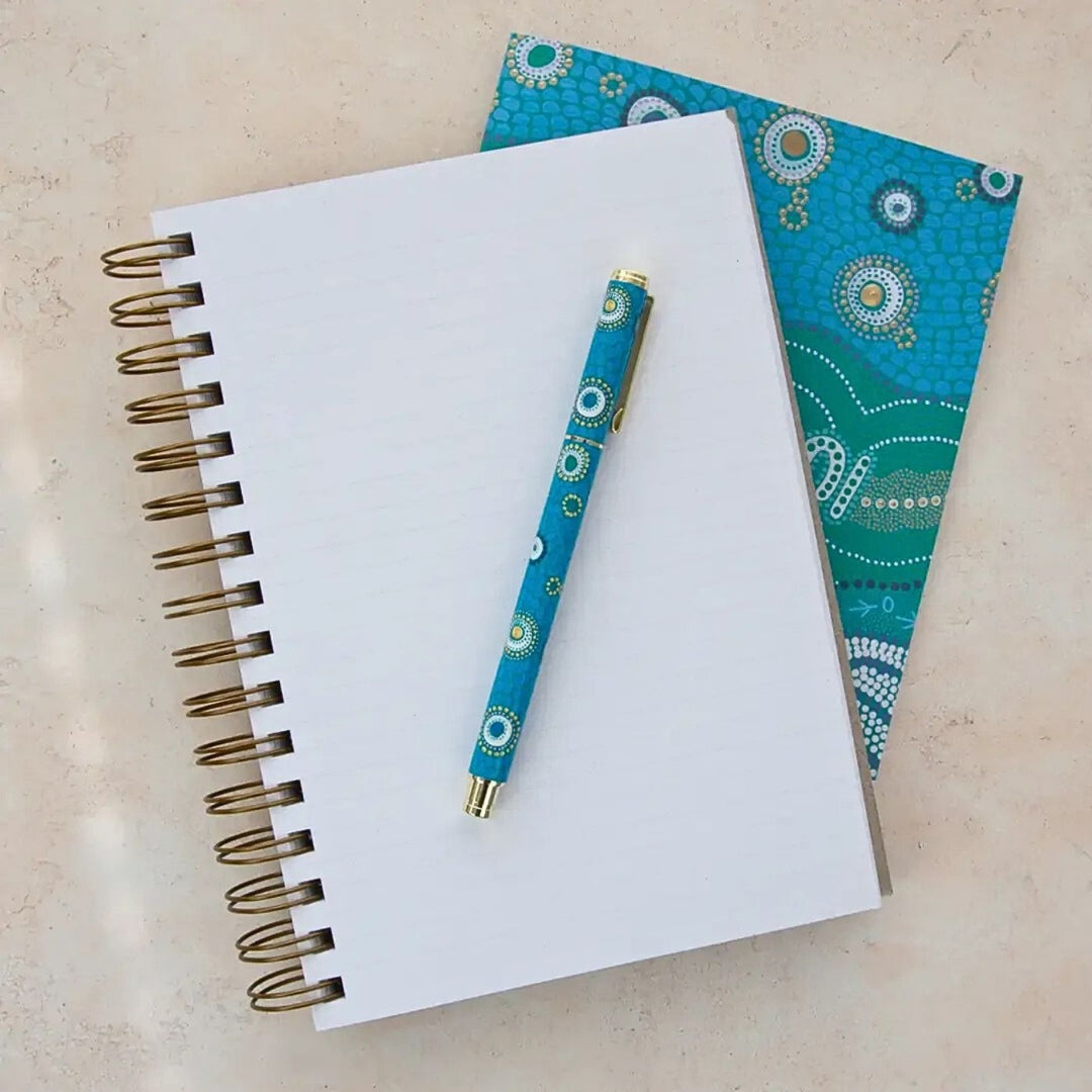A5 Journal (Lined) - Our Favourite Place. Eco friendly, Australian made lined A5 journal. It contains 200 lined pages within a super sturdy hard cover, which features inspiring native botanical artwork by Australian artist Jayne Branchflower. 