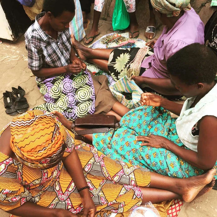 AfriBeads Jewellery is crafted by artisans in Uganda. Traditional skills are used to create this contemporary and stylish range. Each bead is made from a triangle of paper rolled up and lacquered then created into stunning one off pieces. 