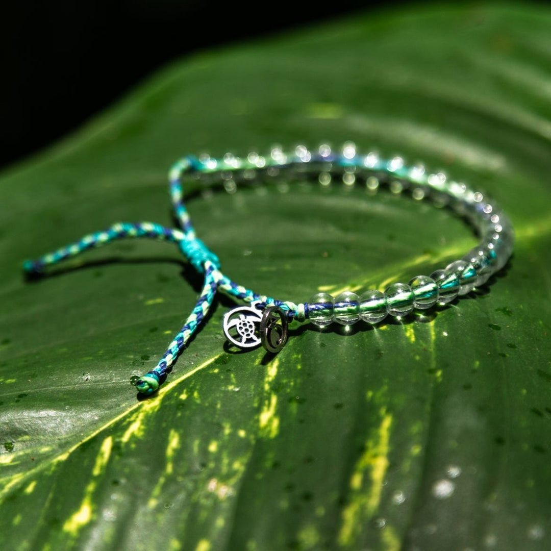 Limited Edition Sea Turtle 2024 bracelet by 4ocean made from recycled glass beads and recycled cord, adjustable eco-friendly ocean cleanup bracelet.