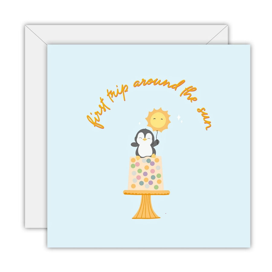 Eco Friendly Greeting Card - First trip around the sun. Celebrate a little one’s first birthday with this adorable penguin card. Featuring a balloon and cake, it’s a heartwarming way to wish them a sunny year ahead. 5% of proceeds support Beyond Blue. Printed locally on recycled paper with sustainable inks.