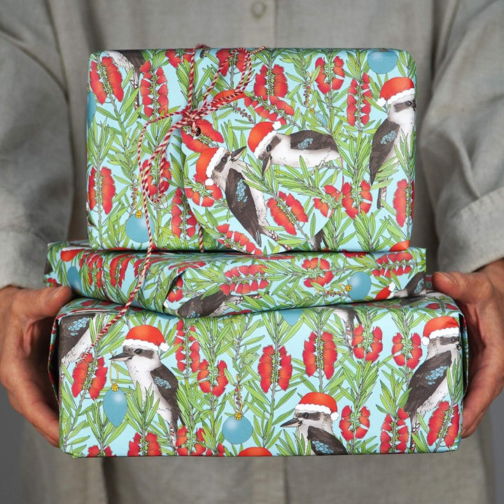 Eco friendly, 100% recycled Christmas wrapping paper featuring Victoria McGrane's art. Carbon neutral with 10% of profits aiding native wildlife and habitat.