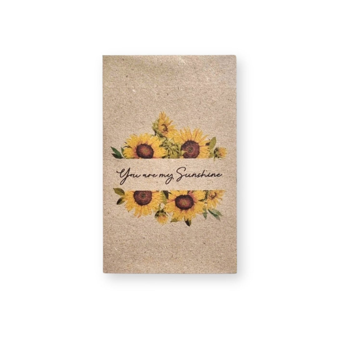 You Are My Sunshine sunflower seed card with sunflower illustration on recycled kraft card