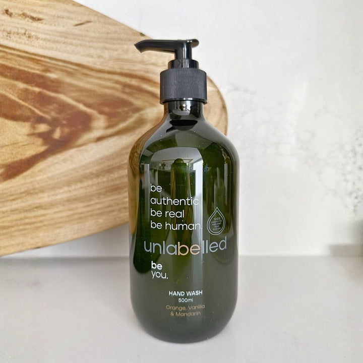 Bottle of Unlabelled Orange, Vanilla & Mandarin Hand Wash with citrus and vanilla notes, in recycled packaging.