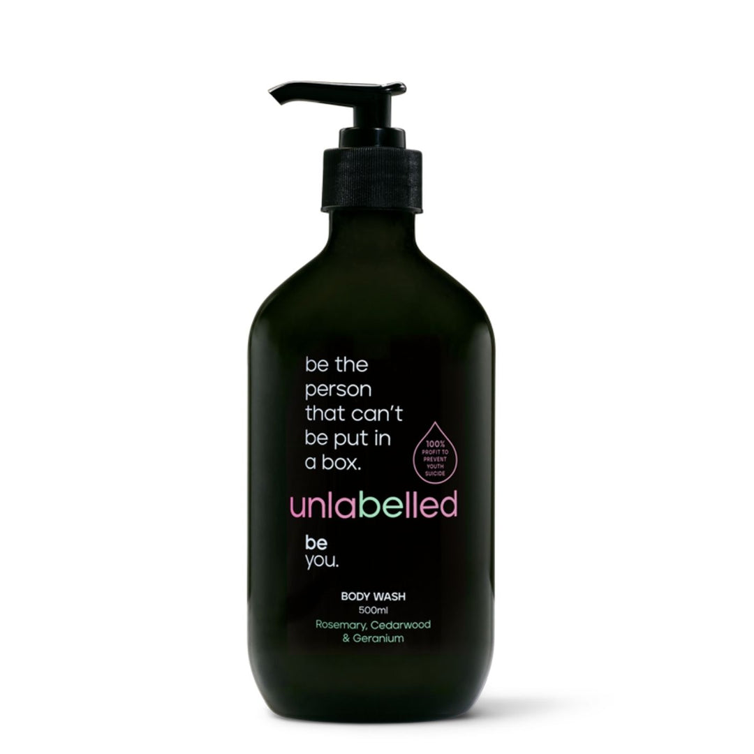 Unlabelled Rosemary, Cedarwood & Geranium Body Wash in recycled bottle with botanical design and herbaceous notes.