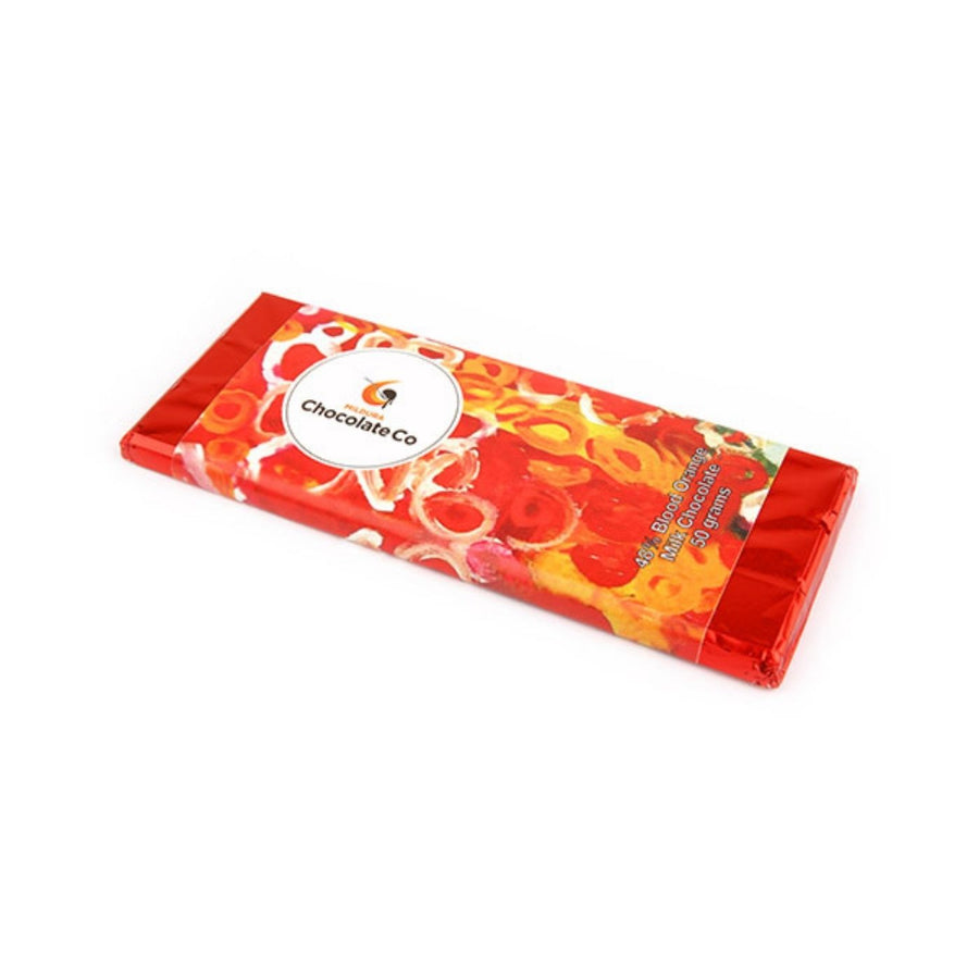 48% Blood Orange Milk Chocolate Bar – 50g, handcrafted in Australia with smooth creamy flavour, supporting local employment and training.