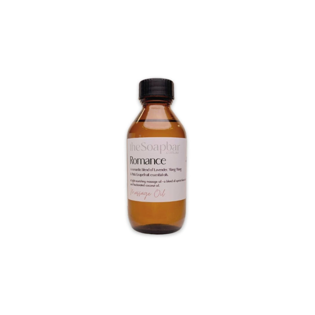 Romance Massage Oil by The Soap Bar in amber glass bottle, made with apricot kernel oil and coconut oil, scented with lavender and ylang ylang essential oils.