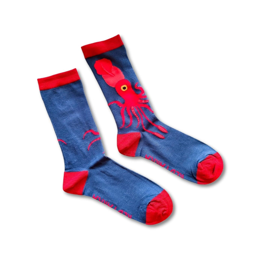Red Parka Colossal Squid Socks - Bright, playful, and full of personality — these cosy Colossal Squid socks are designed in Tasmania by local artists Jennifer Cossins and Tracey Colhoun. These socks add a splash of fun to any outfit.