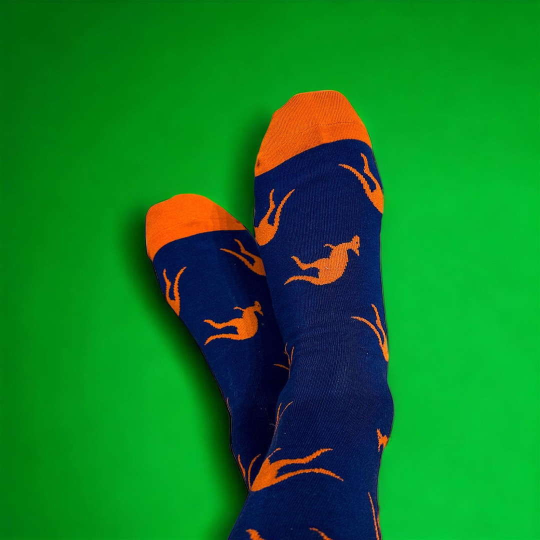 Red Parka Kangaroo Kids' Socks – Designed in Tasmania. A fun Kangaroo socks for kids, designed in Tasmania. Made from soft bamboo. 50% of profits support wildlife and environmental charities.