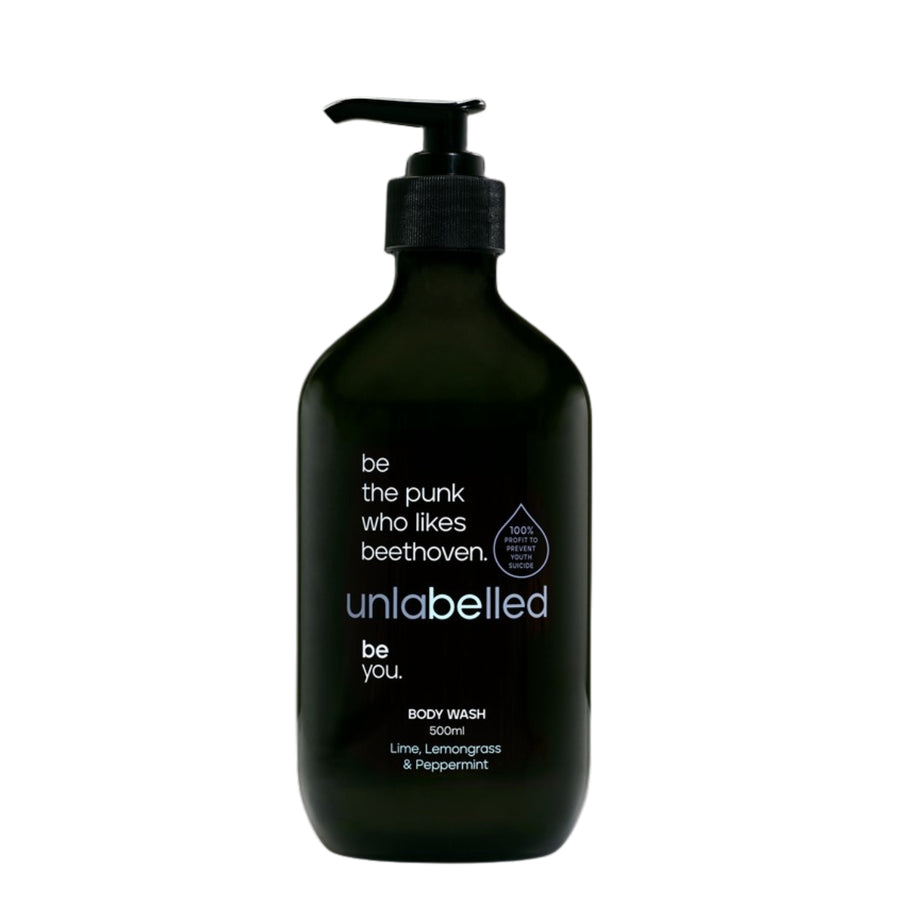 Unlabelled Body Wash - 500ml bottle with lime, lemongrass, and peppermint scent. Sleek black packaging with an empowering message: 'be the punk who likes beethoven'. Unlabelled is a not-for-profit social enterprise dedicated to transforming youth mental health in Australia. With 100% of profits funding critical mental health initiatives.