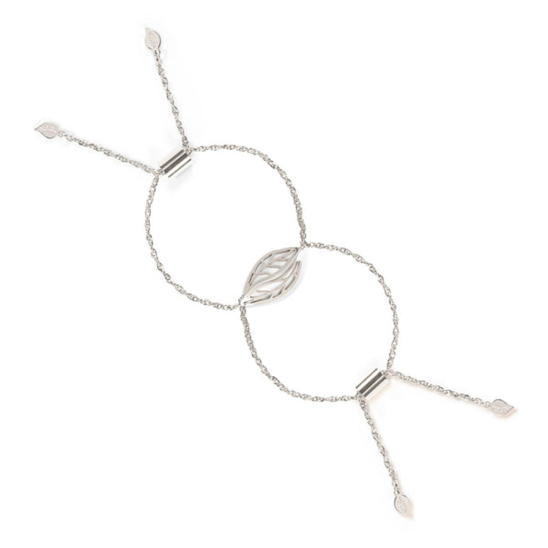 This Eden Embracing Peace Ethical Bracelet with two leaf pendants symbolises connection. Profits support women rescued from trafficking through Eden’s restoration programs.