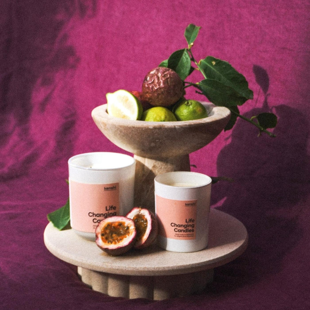 Kenshi Passionfruit and Lime Soy Candle – ethical and hand-poured Australian-made scented candle hand-poured by refugees. Eco-friendly gift idea that supports social enterprise and funds 8 meals with every purchase. Perfect natural soy candle for home fragrance lovers.