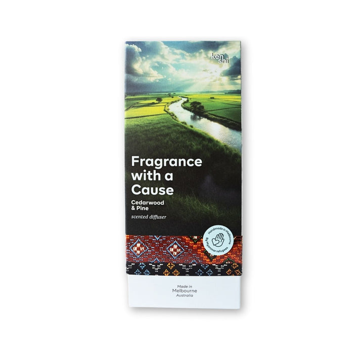 Cedarwood & Pine Signature diffuser with forest-inspired notes, long-lasting fragrance and artisan packaging that supports meaningful craft.