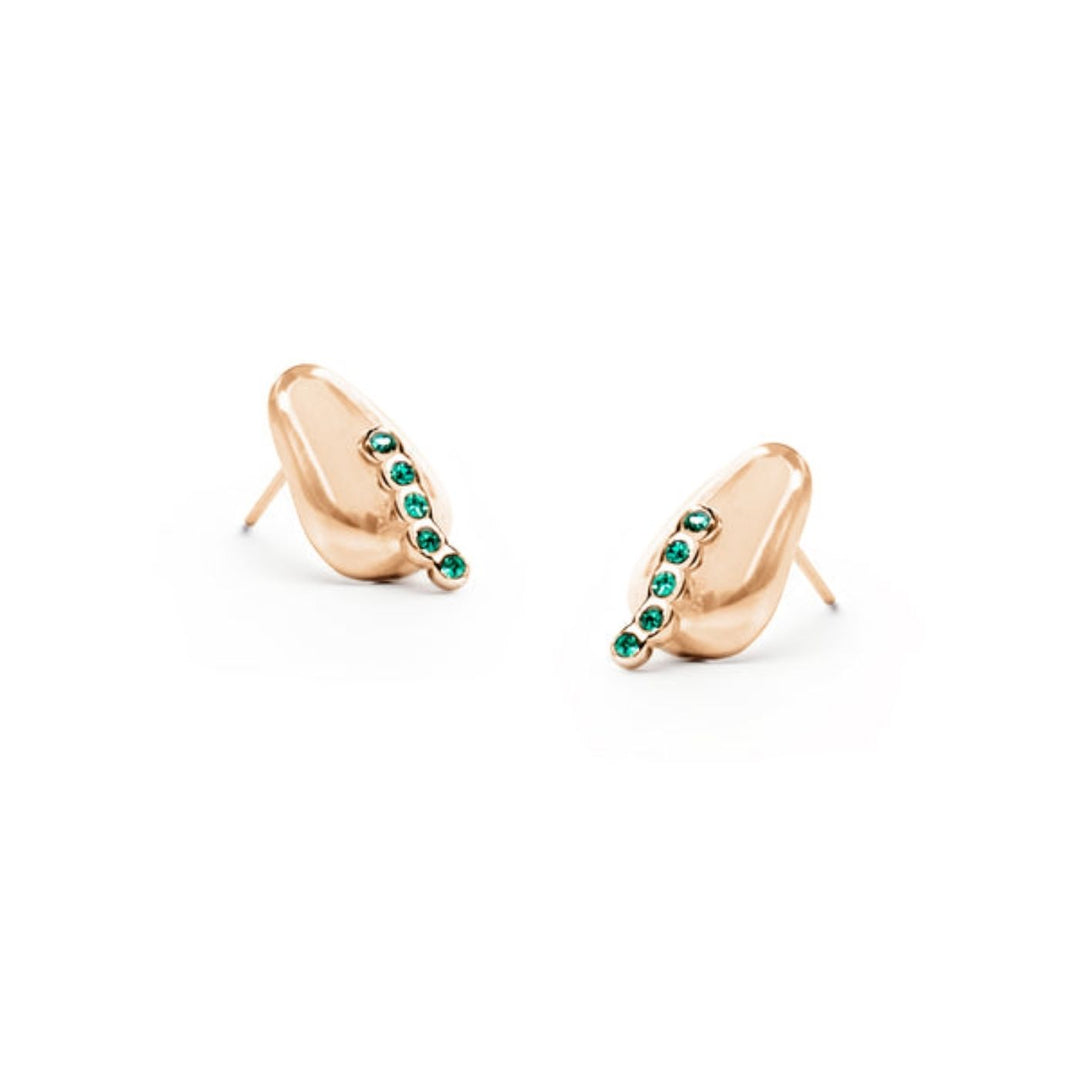 Radicle Post Earrings feature emerald cubic zirconia on medical-grade stainless steel. Profits support women rescued from trafficking through Eden’s programs.