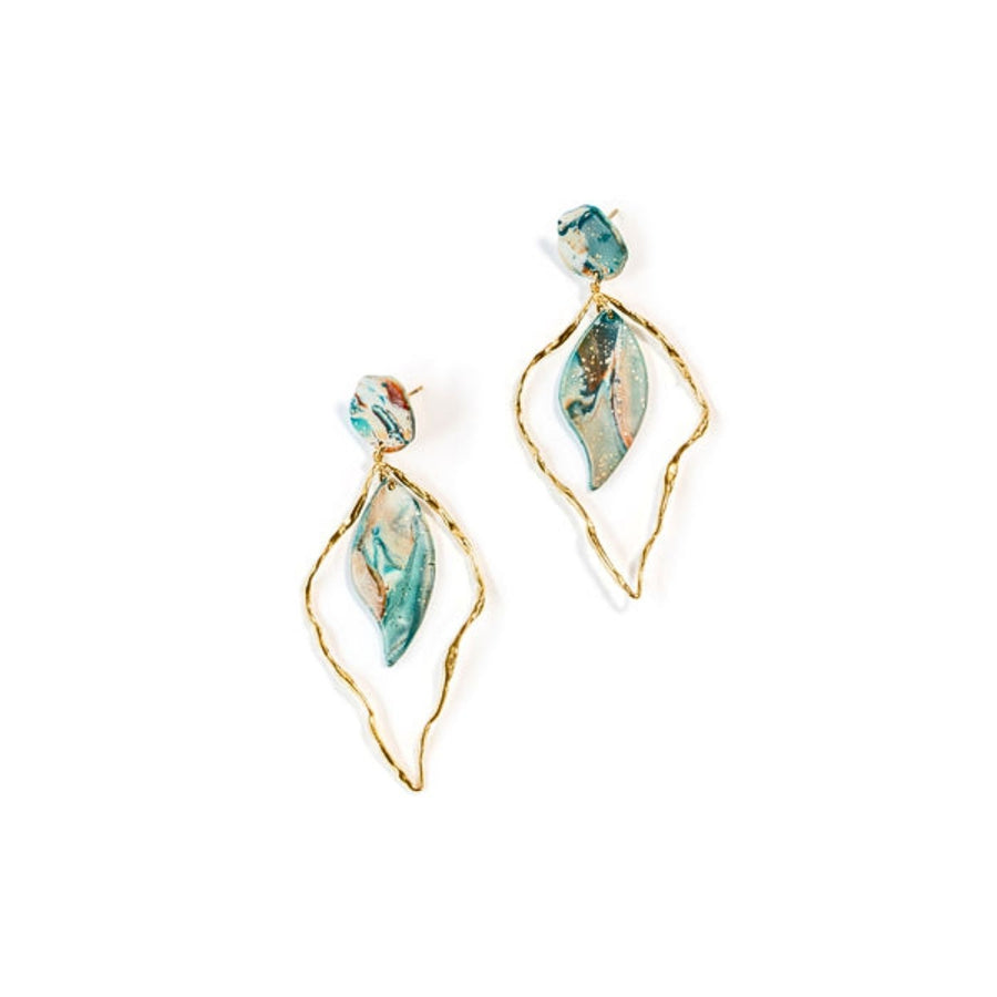 Eden Leaves of Commitment Earrings. These ethical earrings feature leaves with gold foil on 18K gold-plated stainless steel. Profits support women rescued from trafficking through Eden’s programs.