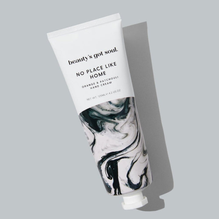 Beauty's Got Soul No Place Like Home Hand Cream 125ml tube, enriched with organic sweet orange and patchouli essential oils. Australian-made; proceeds aid homeless charities.