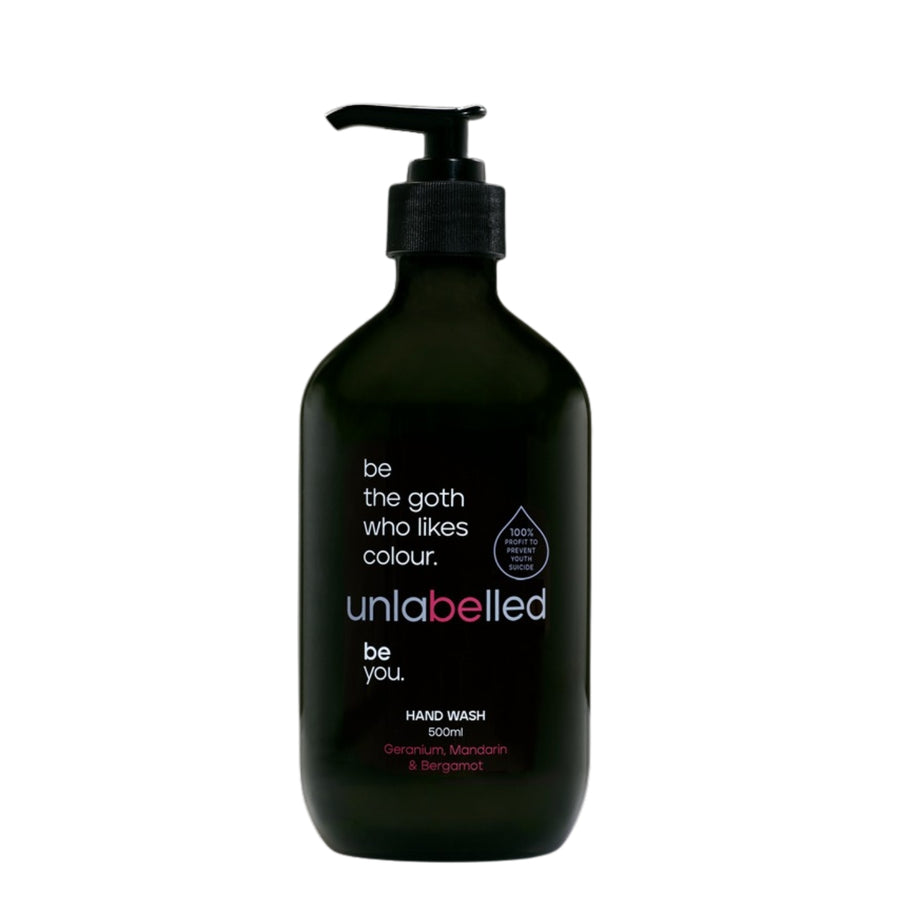 Unlabelled Hand Wash - 500ml bottle with geranium, mandarin, and bergamot scent. Sleek black packaging with an empowering message: 'be the goth who like colour'. Unlabelled is a not-for-profit social enterprise dedicated to transforming youth mental health in Australia. With 100% of profits funding critical mental health initiatives.