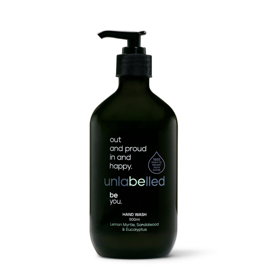 Unlabelled Hand Wash - 500ml bottle with lemon myrtle, sandalwood, and eucalyptus scent. Sleek black packaging with an empowering message: 'out and proud in and happy'. Unlabelled is a not-for-profit social enterprise dedicated to transforming youth mental health in Australia. With 100% of profits funding critical mental health initiatives.