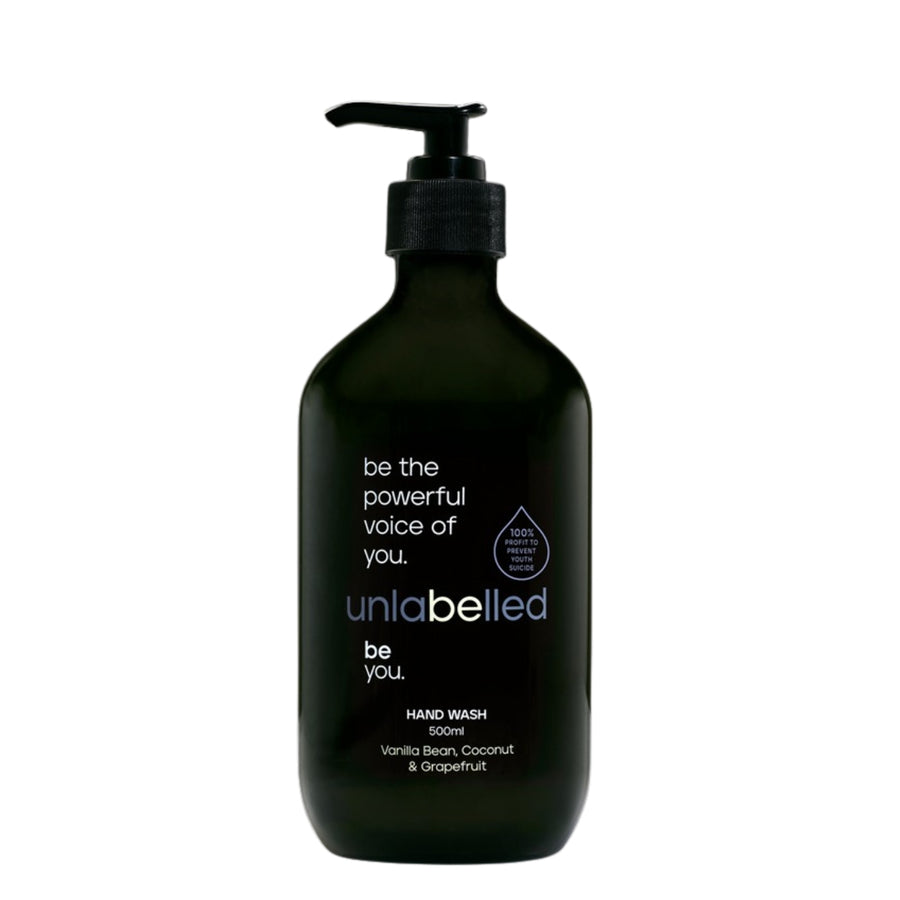 Unlabelled Hand Wash - 500ml bottle with vanilla bean, coconut, and grapefruit scent. Sleek black packaging with an empowering message: 'be the powerful voice of you'. Unlabelled is a not-for-profit social enterprise dedicated to transforming youth mental health in Australia. With 100% of profits funding critical mental health initiatives.