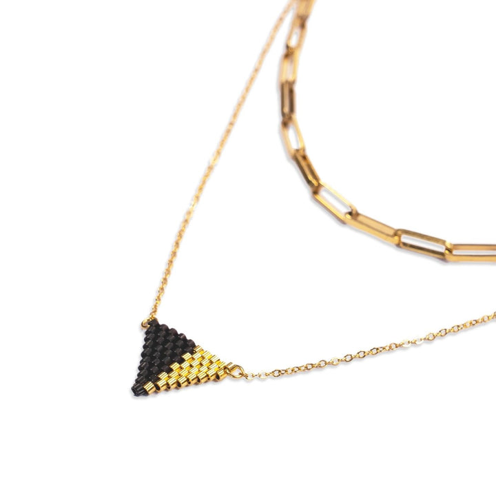 Eden Be Light Necklace Bundle is handcrafted with black glass beads and 18K gold-plated stainless steel, these ethical earrings support women rebuilding their lives through Eden’s programs.