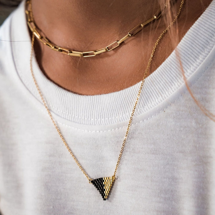 Eden Be Light Necklace Bundle is handcrafted with black glass beads and 18K gold-plated stainless steel, these ethical earrings support women rebuilding their lives through Eden’s programs.