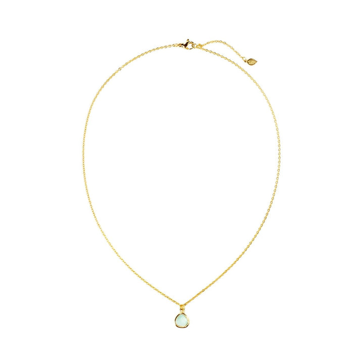 Eden Desert Sunrise Necklace has a pink or teal glass stone on an 18K gold-plated chain. Profits support women rescued from trafficking through Eden’s programs.