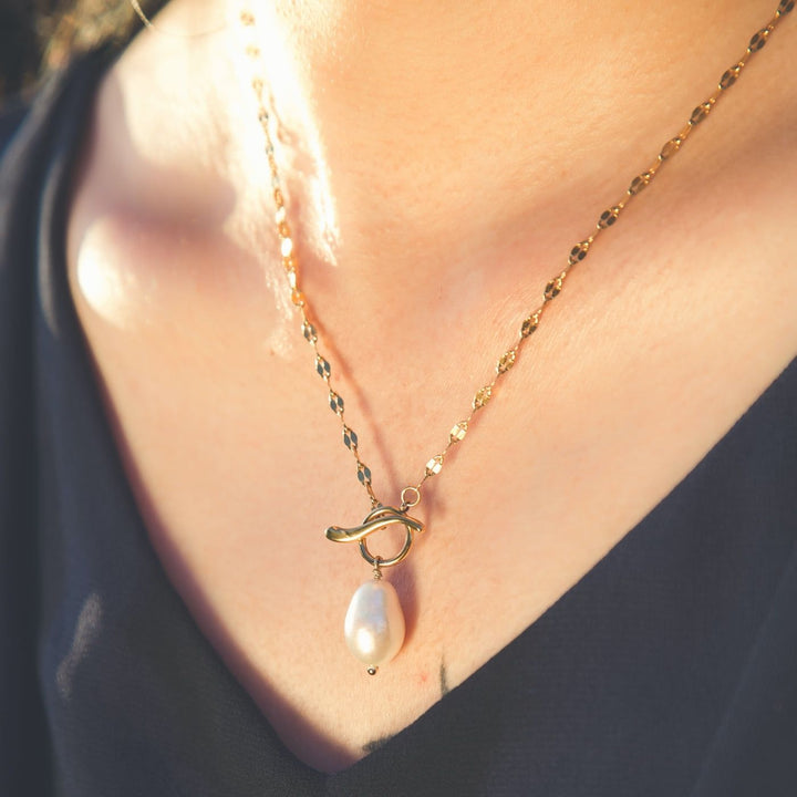 Eden Walk on Water Pearl Necklace. This ethical necklace features a baroque pearl on an 18K gold-plated chain. Profits support women rescued from trafficking through Eden’s restoration programs.