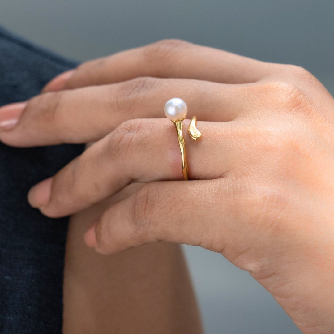 Eden - Milk & Honey Ring. Gold-plated ring with a freshwater pearl, handcrafted by women at Eden. A meaningful piece that supports survivor care and empowerment.