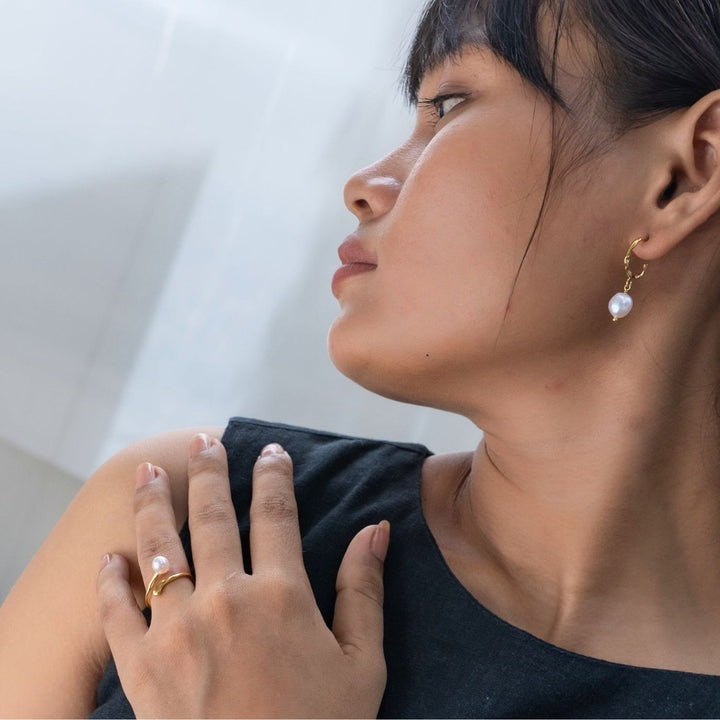 Eden - Milk & Honey Ring. Gold-plated ring with a freshwater pearl, handcrafted by women at Eden. A meaningful piece that supports survivor care and empowerment.