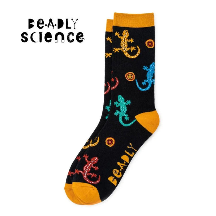 Sydney Sock Project Gecko crew socks. With every pair of Sydney Sock Project socks purchased, you're contributing to meaningful causes. They are dedicated to supporting charities and organisations that strive to make a difference for our people and planet.