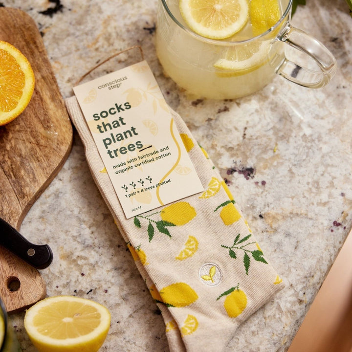 Conscious Step Ethical Socks that Plant Trees - Lemons (3 Pack). These lemon-print organic cotton socks help plant trees & improve lives. Each pair supports Trees for the Future & their work to restore land and fight hunger.