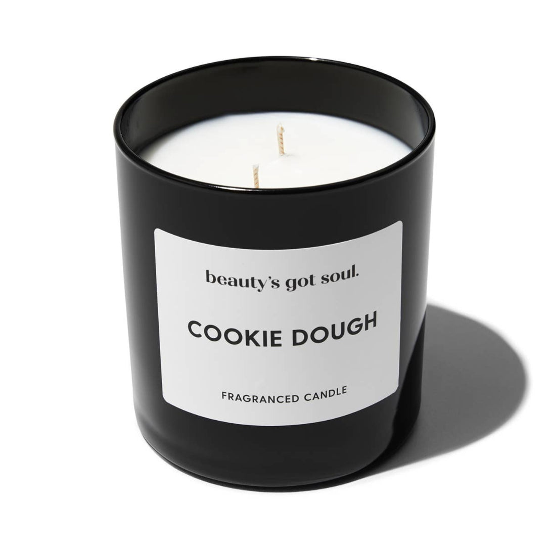 Beauty's Got Soul Cookie Dough Maxi Candle in a 290g glass jar with a wooden lid, offering a warm, sweet scent of coconut, maple syrup, and vanilla. Made from non-toxic soy wax with a lead-free cotton wick, supporting charities for the homeless.