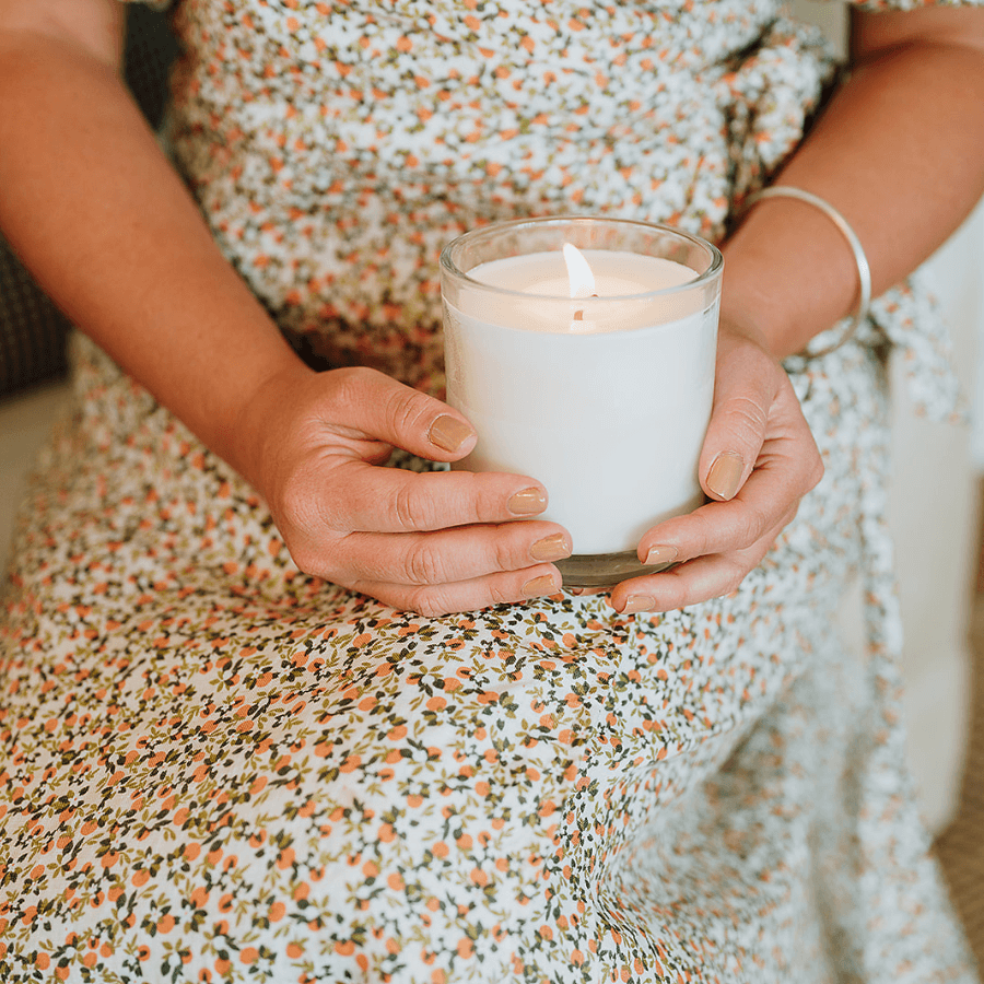 This Ocean Breeze soy candle offers a clean, organic burn up to 80 hours. Refill any empty candle container to help light homes for domestic violence survivors.