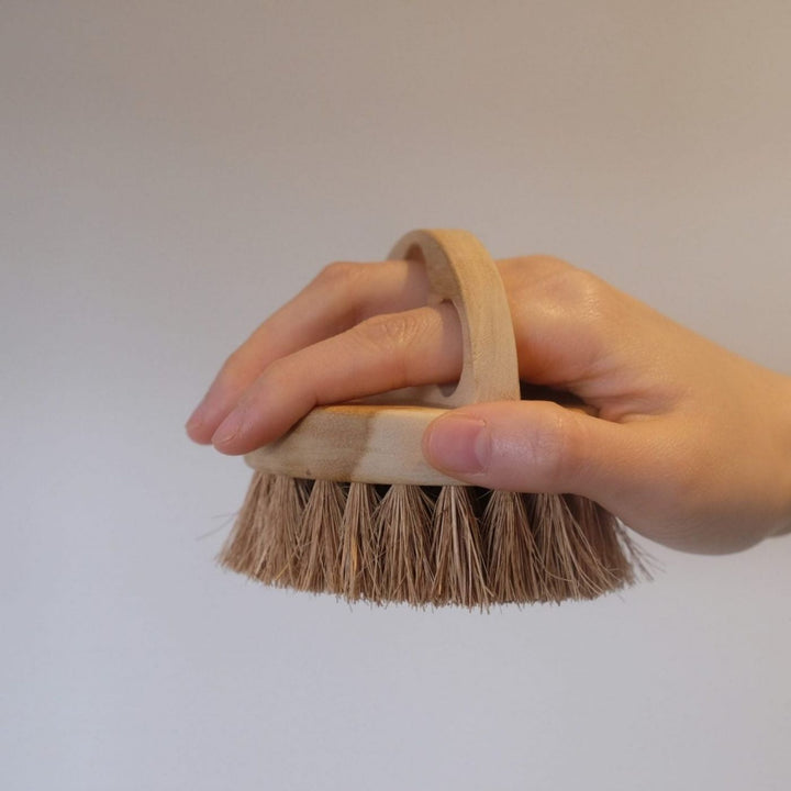 Kayu Wooden Multipurpose Brush is handcrafted from teak and coconut fibre to gently clean veggies. Ethically made in Indonesia by women-led artisans.