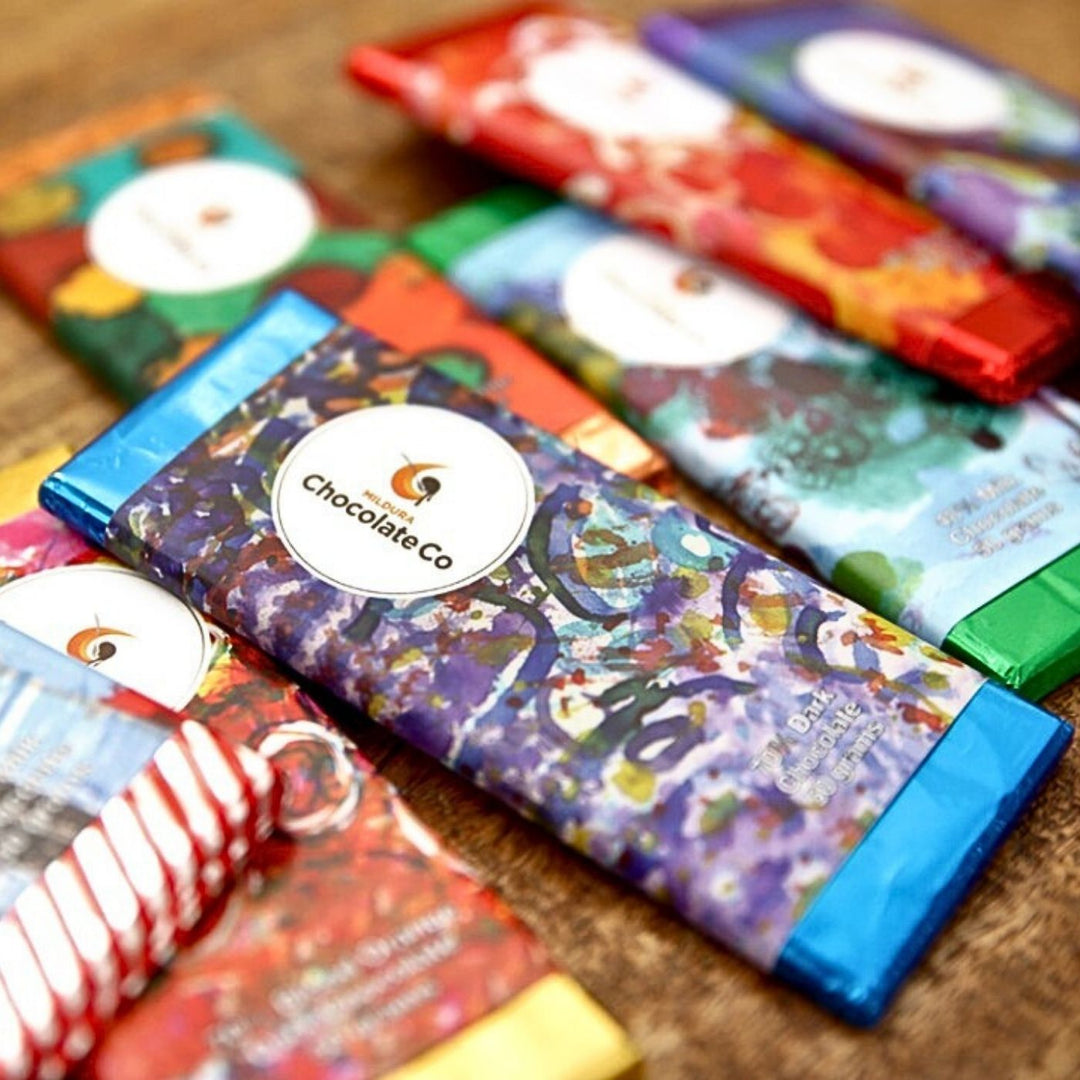 Assorted Mildura Chocolate bars, handcrafted in Australia with locally inspired flavours, supporting employment for people with disabilities.