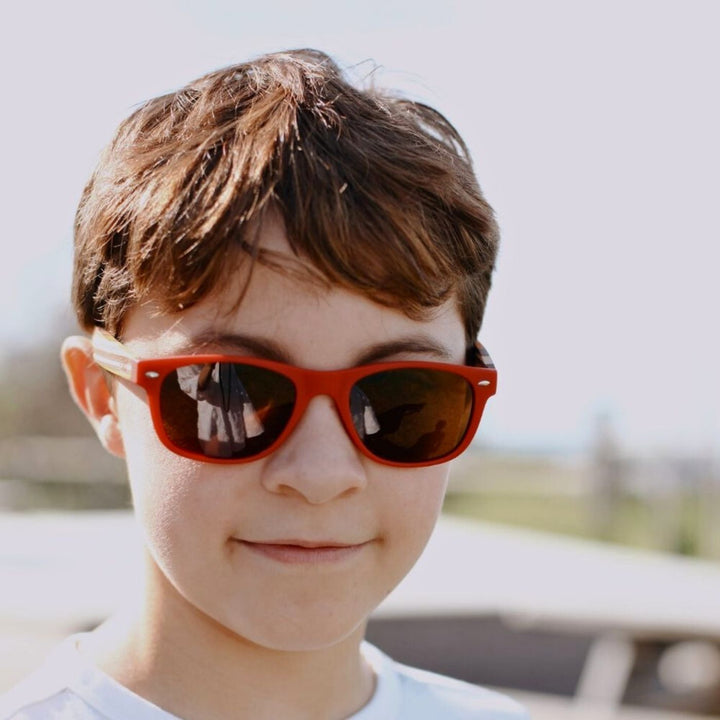 Sustainable SOEK Sunglasses for Kids - Little Avalon Red Sunnies with Polarised Lens for Age 7-10. Stylish, sustainable eyewear that gives back — SOEK plants one tree for every pair sold. Look good, do good, and help reforest the planet with every purchase.