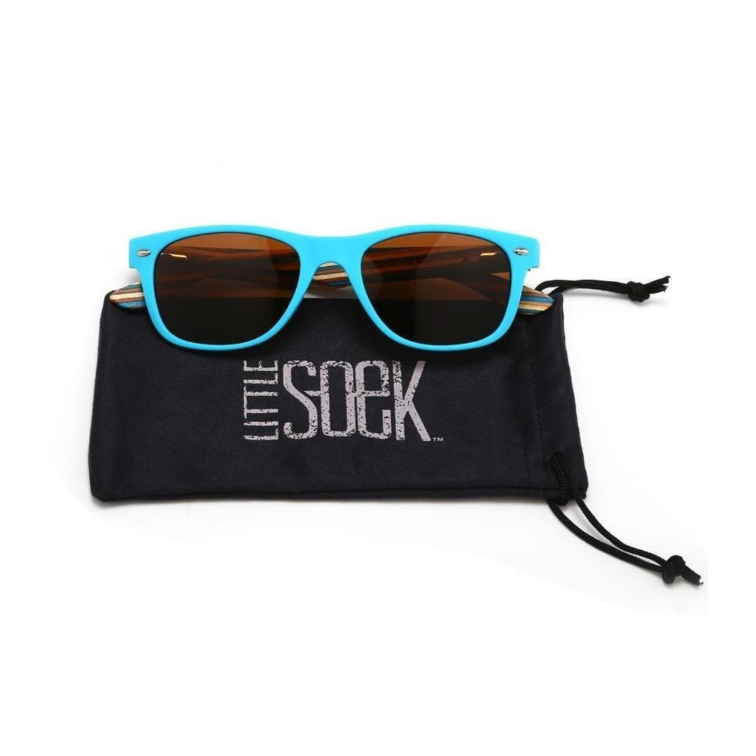 Sustainable SOEK Sunglasses - Kids Sunnies. Stylish, sustainable eyewear that gives back — SOEK plants one tree for every pair sold. Look good, do good, and help reforest the planet with every purchase.
