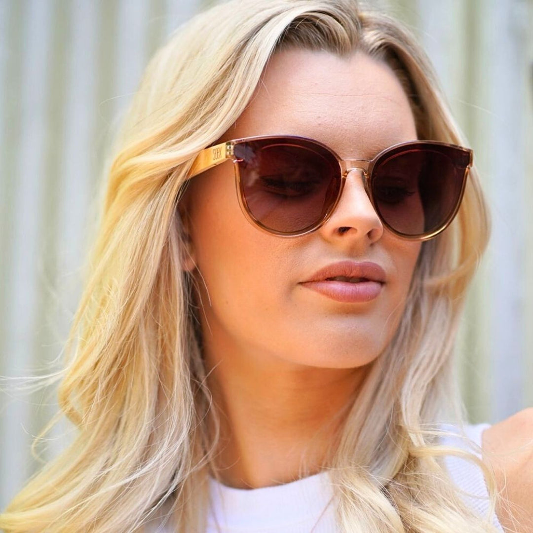 Bella Champagne with Brown Gradient Lens and Maple Arms. Stylish, sustainable eyewear that gives back — SOEK plants one tree for every pair sold. Look good, do good, and help reforest the planet with every purchase