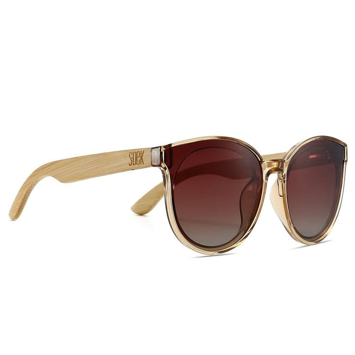 Sustainable Sunglasses - Bella Champagne with Brown Gradient Lens and Maple Arms. Stylish, sustainable eyewear that gives back — SOEK plants one tree for every pair sold. Look good, do good, and help reforest the planet with every purchase
