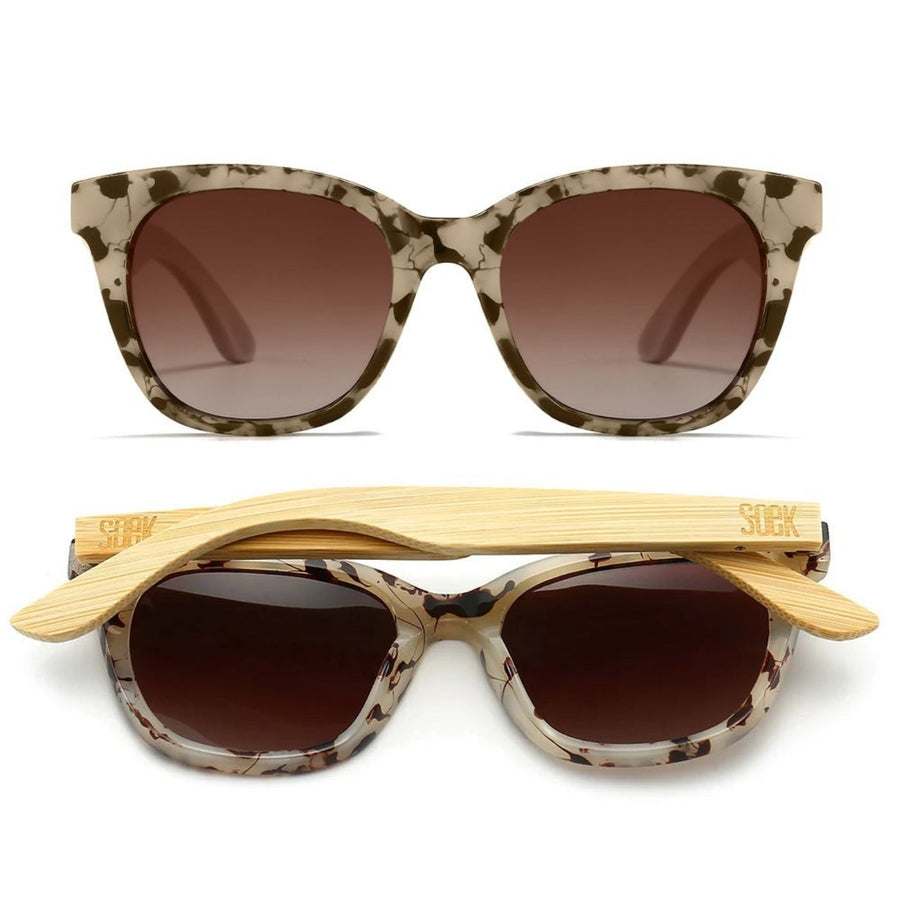Sustainable SOEK Sunglasses - Lila Grace Ivory Tortoise with Brown Lens and White Maple Arms. Stylish, sustainable eyewear that gives back — SOEK plants one tree for every pair sold. Look good, do good, and help reforest the planet with every purchase.